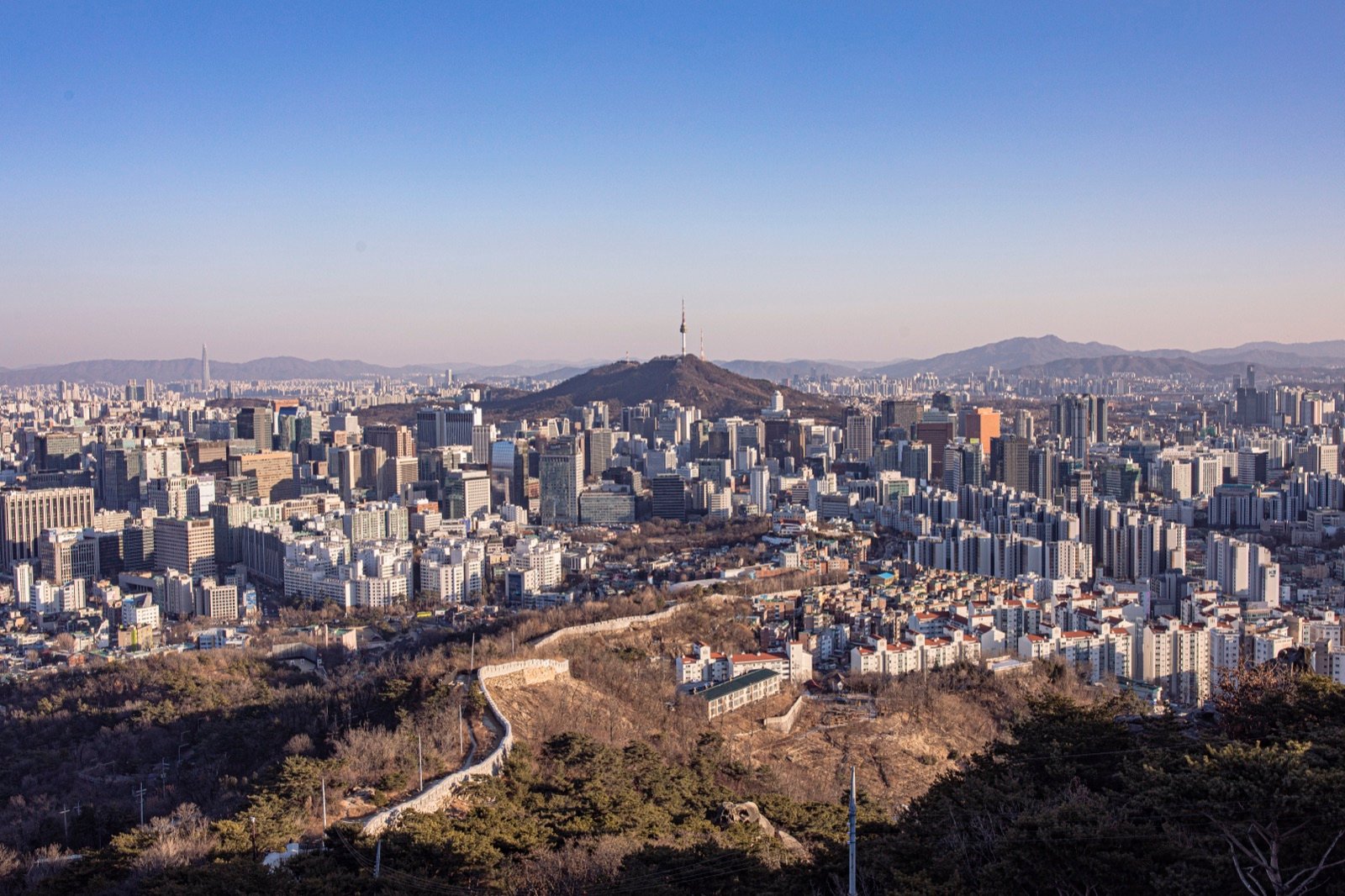 Downtown Seoul from Inwangsan, with N Seoul Tower on Namsan and the old city wall